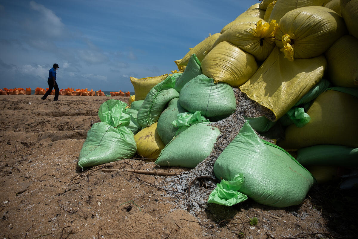 Bags pile up during clean-up efforts by the Sri Lankan Navy and Marine Environmental Protection Authority on Sarakkuwa beach in Negombo on June 7, 2021. (Photo: Tashiya de Mel / Greenpeace)