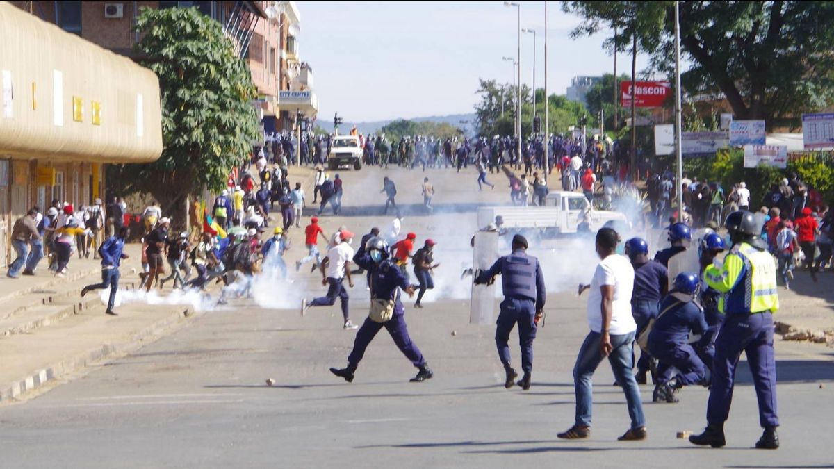 Police disperse a march in Manzini, Eswatini, on May 21 following the alleged police killing of Thabani Nkomonye. (Photo: Economic Freedom Fighters of Swaziland / Facebook)
