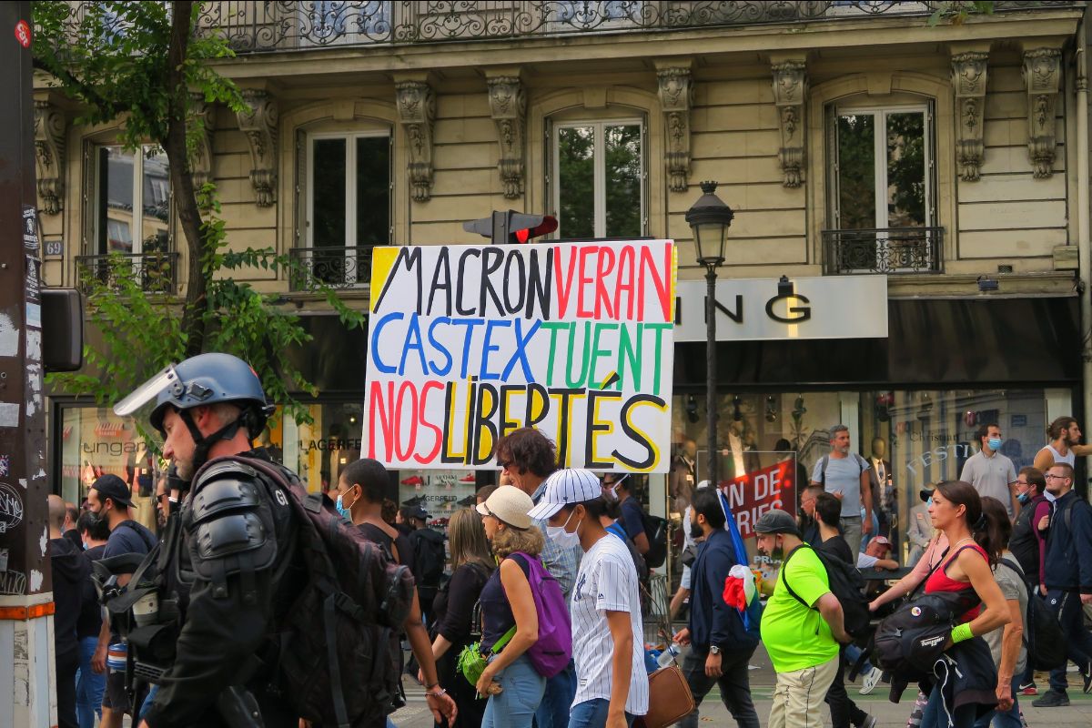 Demonstrators gather in Paris on July to protest the expansion of France's coronavirus pass. (Photo: Paola Breizh / Flickr) 