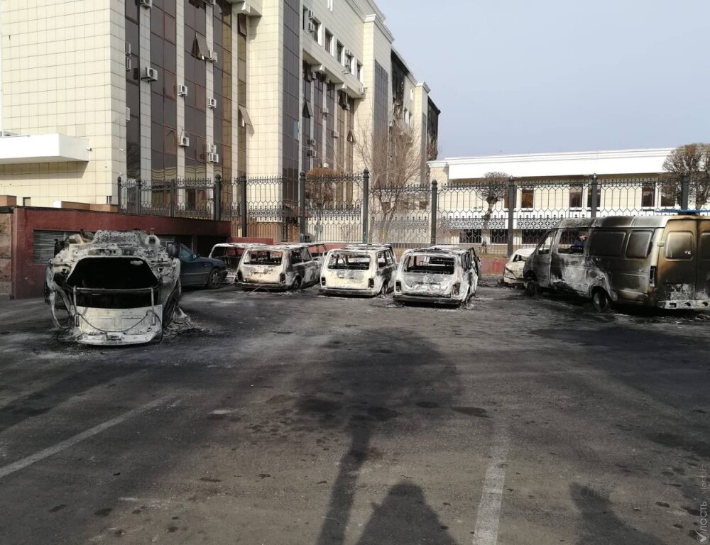 Burned-out shells of cars in Kazakhstan following protests