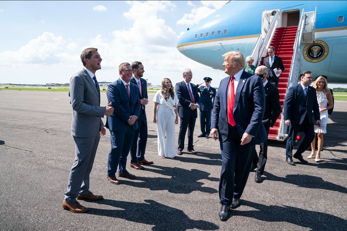 Former President Donald Trump is greeted by local officials during a trip to Tampa, Fla., in July 2020. Trump's residence in the state was raided this week by the FBI, reportedly in connection with classified material. (Photo: White House / Joyce N. Boghosian)