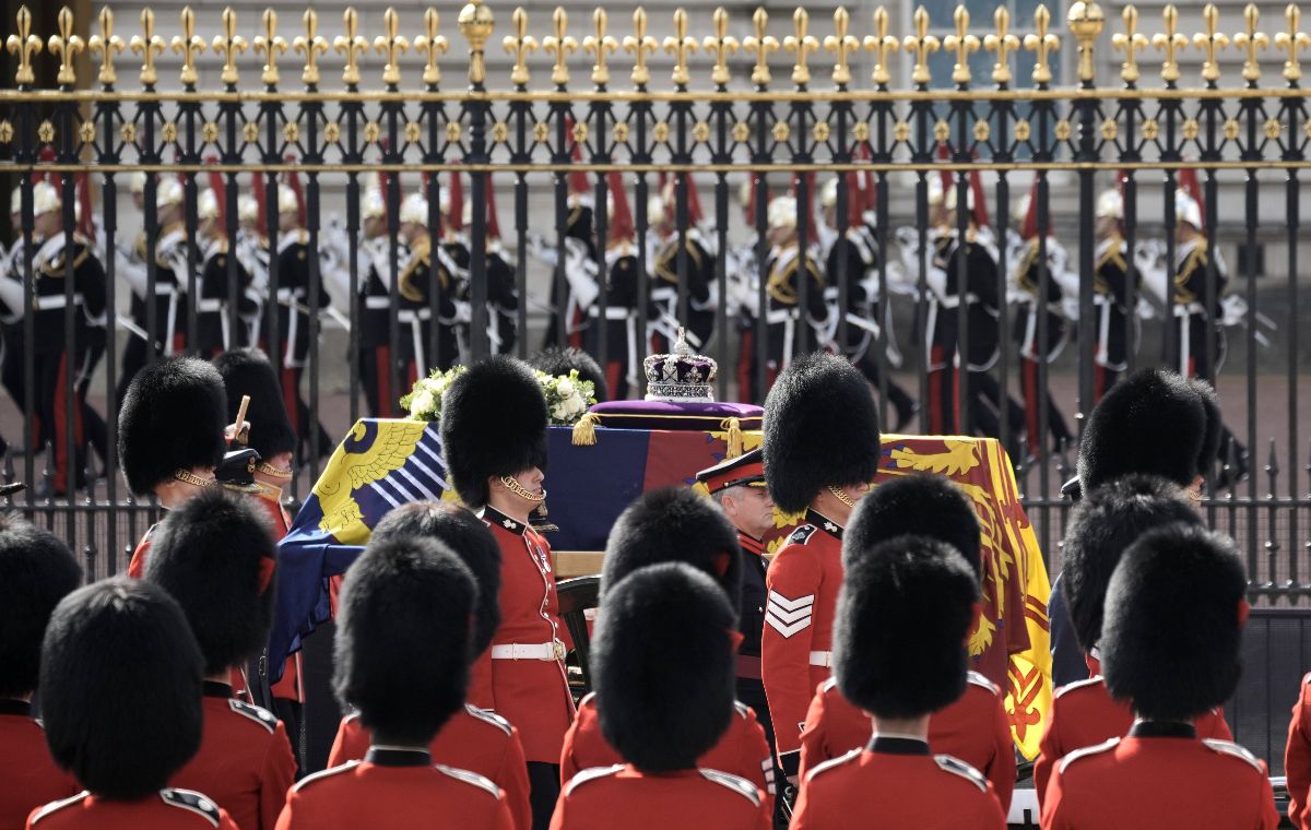 Queen Elizabeth's coffin was taken from Buckingham Palace to the Palace of Westminster in a solemn procession on Wednesday, where she will lie in state until her funeral on Monday.
