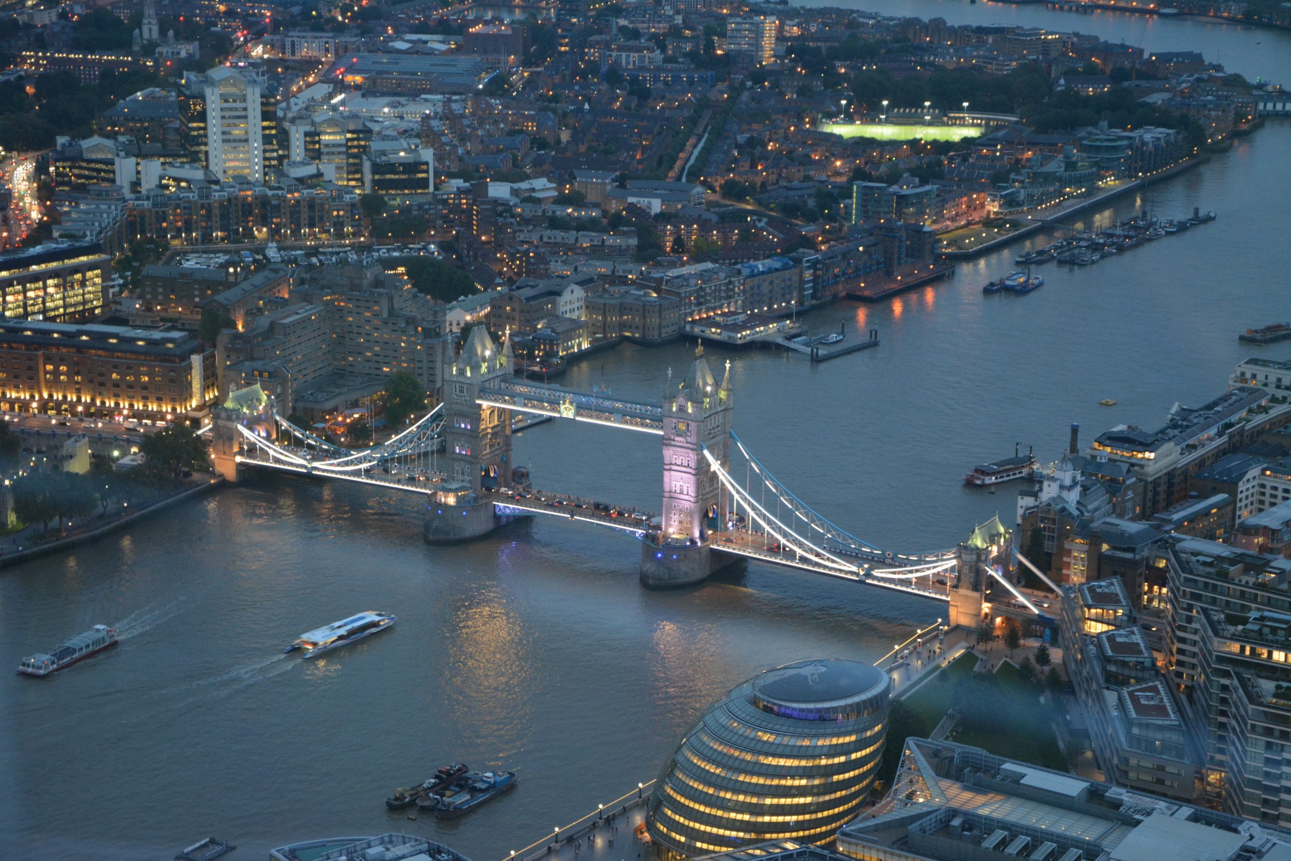 Aerial photo of London Tower Bridge in the early evening.