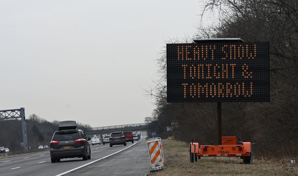 A sign warns of heavy snow on New York's Long Island Expressway in January 2022
