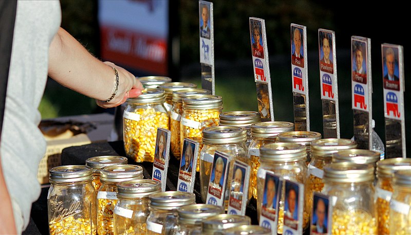 Dried kernels of corn in jars represent the voting interests in the GOP straw poll of 2011