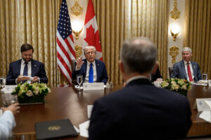 President Donald Trump hosts a working lunch meeting with Canadian Prime Minister Mark Carney in October 2025.